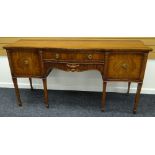 A REPRODUCTION MAHOGANY REGENCY-STYLE SIDEBOARD having a serpentine front with centre drawer and