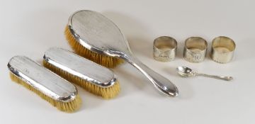 A PARCEL OF MIXED SILVER ITEMS comprising two non-matching silver backed brushes and three silver