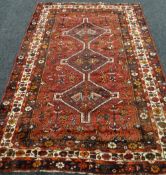 100% WOOL PILE RED GROUND FLOWER PATTERNED IRANIAN RUG 250 x 166cms