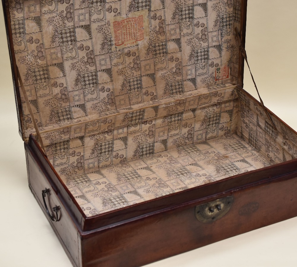 A CHINESE TRUNK IN PIG-SKIN LEATHER with two handles and printed interior, 76cms wide - Image 2 of 2