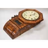 A WALNUT ENCASED EIGHT DAY PENDULUM WALL CLOCK with marquetry decoration and carved oak laurel