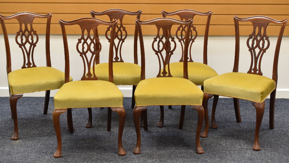 A SET OF SIX CHIPPENDALE-STYLE CHAIRS with stuff over green upholstered seats