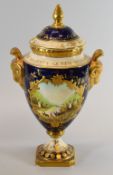 A COMMEMORATIVE COALPORT PORCELAIN COVERED VASE for the 1978 Jubilee and having a scene of a