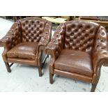 A PAIR OF BUTTONED BROWN LEATHER TUB-STYLE ARMCHAIRS