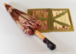 AN UNUSUAL CHILD'S PARASOL, CIRCA 1920 having a sycamore and Bakelite handle in the form of duck's