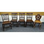 A SET OF FOUR FARMHOUSE CHAIRS AND A CARVED HERALDIC HALL CHAIR