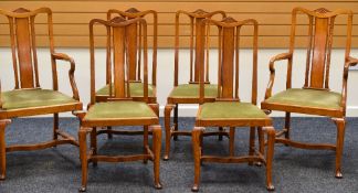 A SET OF SIX OAK DINING CHAIRS four + two with drop in green upholstered