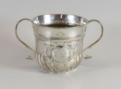 A GEORGE III BRITANNIA STANDARD SILVER PORRINGER with fluted lower body, gadrooned band and with