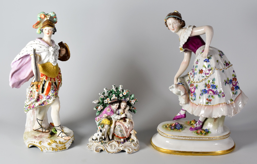 THREE PORCELAIN FIGURES comprising a Capodimonte figurine of a lady in floral dress, a Continental