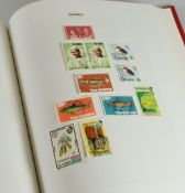 A RED STAMFORD MAJOR STAMP ALBUM comprehensively filled with 'British Commonwealth Stock'