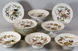 A HAVILAND PORCELAIN PART DESSERT SERVICE comprising three low tazzas, a pair of higher and eleven