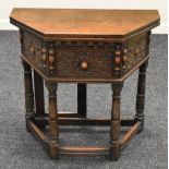 A CARVED ANTIQUE-REPRODUCTION HALF MOON HALL TABLE with foldover top and centre drawer