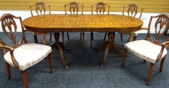 A REPRODUCTION MAHOGANY REGENCY-STYLE DINING SUITE comprising inlaid oval table and four + two