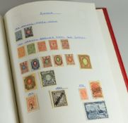 A RED STAMFORD MAJOR STAMP ALBUM comprehensively filled with 'World Letters K-Z'