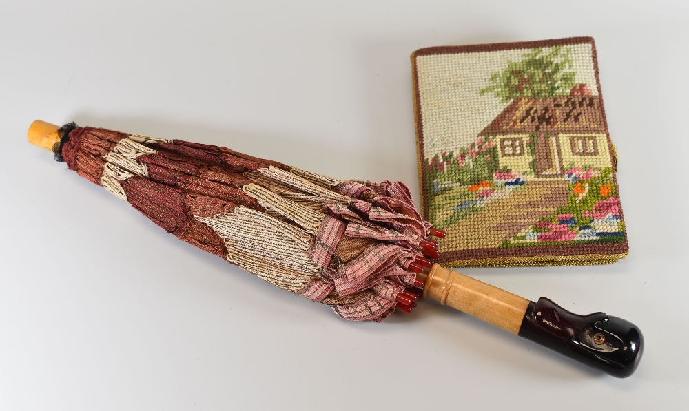 AN UNUSUAL CHILD'S PARASOL, CIRCA 1920 having a sycamore and Bakelite handle in the form of duck's - Image 2 of 3