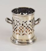 A SILVER BOTTLE HOLDER with twin-handles and openwork body, Sheffield 1905, 4.3ozs