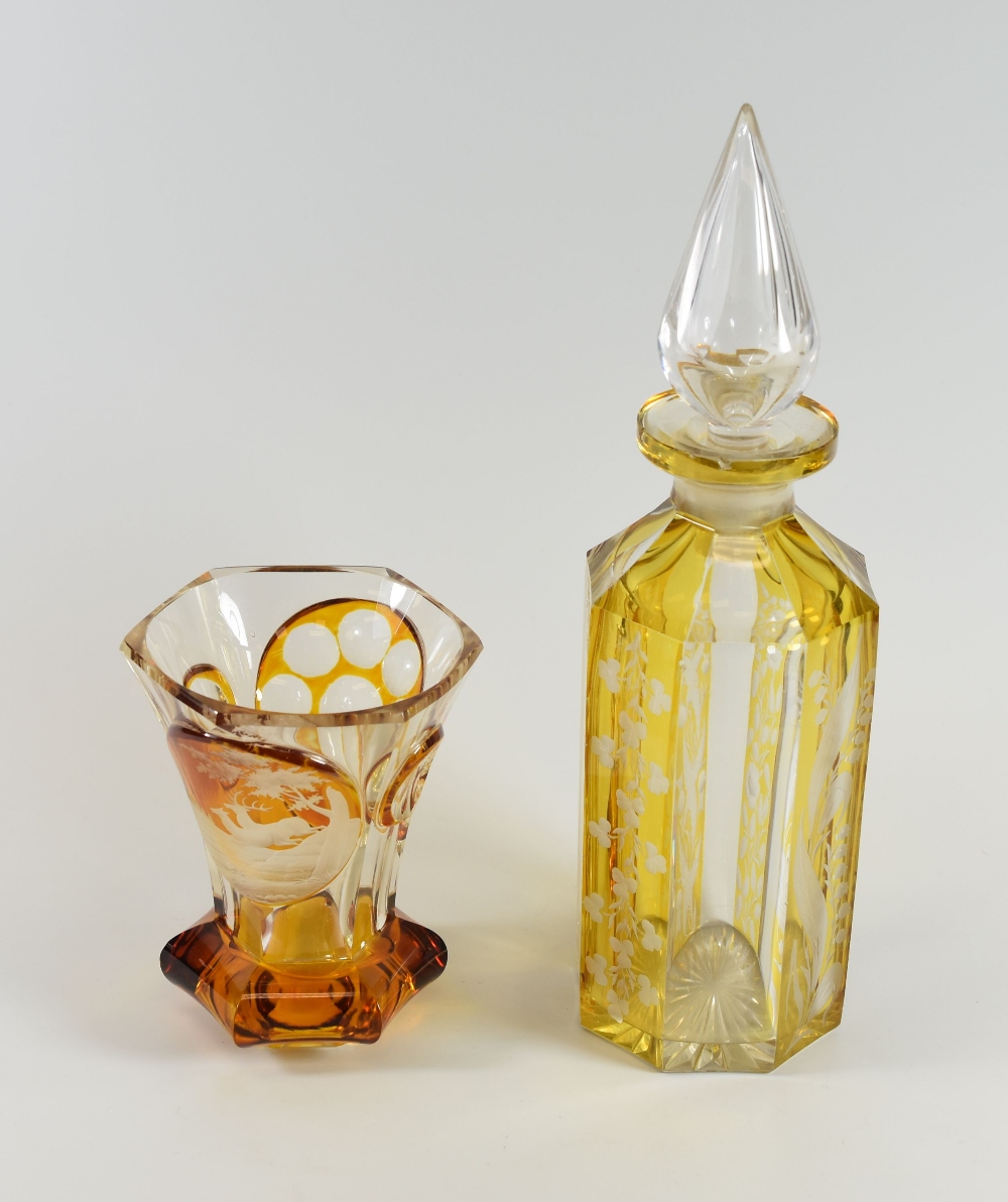 AN ETCHED & COLOURED GLASS VASE on an hexagonal base with a cameo of two stag deer leaping in