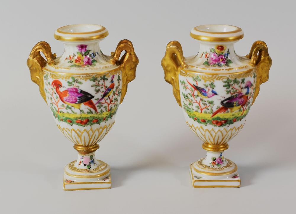 A PAIR OF CHELSEA PORCELAIN MINIATURE VASES of campana form on square bases with gilded goat-head
