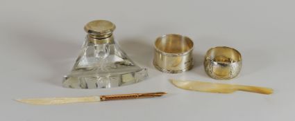 A PARCEL OF SILVER / MOTHER OF PEARL ITEMS comprising silver topped glass inkwell, an ink-pen with