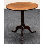 A NINETEENTH CENTURY CIRCULAR TOPPED TRIPOD TABLE