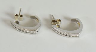 A PAIR OF 18K WHITE GOLD & DIAMOND HALF-HOOP STUD EARRINGS with rows of nine graduated diamonds to