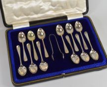 A CASED SET OF TWELVE SILVER SPOONS & TONGS, Sheffield 1915, 5.3ozs total