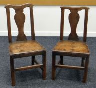 A NEAR PAIR OF EARLY NINETEENTH CENTURY FARMHOUSE CHAIRS