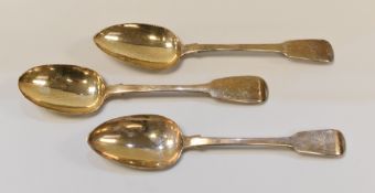 A SET OF THREE SILVER SERVING SPOONS with monogrammed terminals, London 1831/1834, 6.3ozs