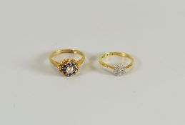 A DIAMOND FLORAL CLUSTER RING & ANOTHER