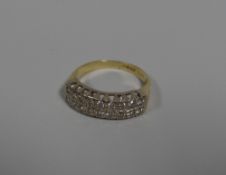 AN 18CT YELLOW GOLD HALF HOOP DIAMOND ETERNITY RING having two rows of nine diamonds each, total