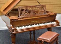 A BECHSTEIN MODEL 'A' GRAND PIANO in a rosewood case on turned octagonal legs and having eighty-five