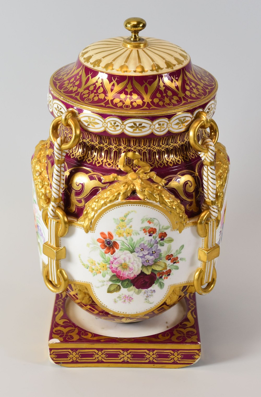 AN ENGLISH PORCELAIN ICE PAIL the body profusely gilded to a monarch-red reserve and having four