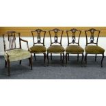 A SET OF FOUR EDWARDIAN CARVED BACK DRAWING ROOM CHAIRS with stuff over upholstered seats together