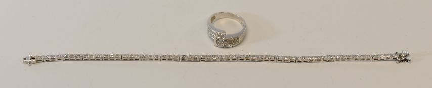 AN 18K WHITE GOLD & DIAMOND TENNIS BRACELET & SIMILAR RING, 14.1gms total