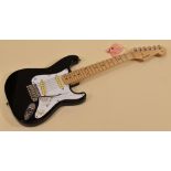 A FENDER STRATOCASTER ELECTRIC GUITAR original contour body, black with white scratchplate, serial