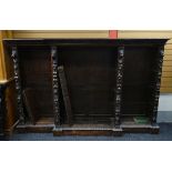 A LARGE CARVED BREAK-FRONT OPEN BOOKCASE, 160cms high x 250cms wide