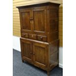 A GOOD NINETEENTH CENTURY WELSH OAK PRESS CUPBOARD OF SMALL PROPORTIONS composed of a two-door