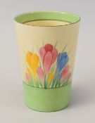 A CLARICE CLIFF 'CROCUS' BEAKER, 11.5cms high