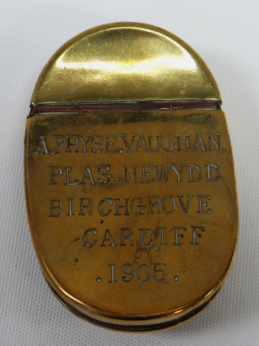 A CURVED BRASS TOBACCO BOX with hinged lid and inscribed 'A PRYSE VAUGHAN PLAS NEWYDD, BIRCHGROVE, - Image 2 of 3
