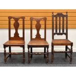 A PAIR OF FARMHOUSE CHAIRS having shaped splat backs and with turned and block stretchers;