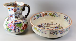 A MASONS IRONSTONE JUG & BASIN of faceted form and decorated with flowers and exotic colourful