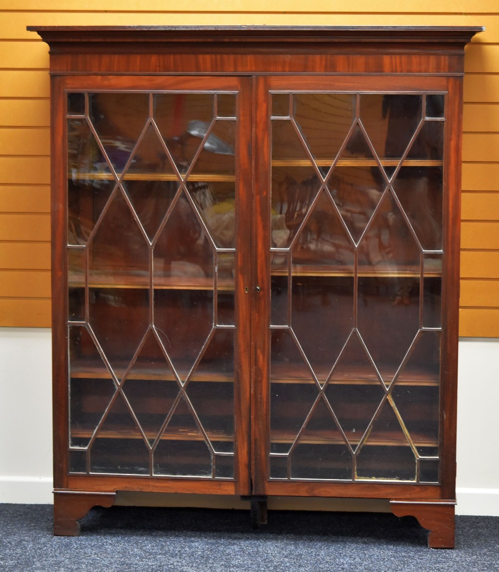 A NINETEENTH CENTURY MAHOGANY BOOKCASE CUPBOARD-TOP with two astragal glazed doors on later