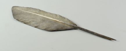 AN EARLY VICTORIAN SILVER PRESENTATION QUILL inscribed in italics to the handle 'Prize gained by W