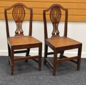 A PAIR OF FARMHOUSE CHAIRS with shaped comb backs