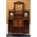 AN EDWARDIAN ROSEWOOD CABINET SIDEBOARD of serpentine form with centre two-door cupboard, and with