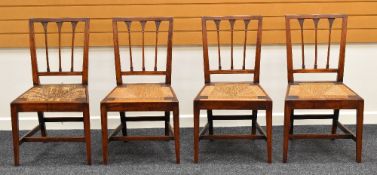 A SET OF FOUR FRUIT WOOD CHAIRS in the farmhouse-style with rush seats