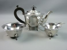 A SILVER THREE PIECE TEASET having wavy rim decoration on hoof feet, Sheffield 1932, 21 troy ozs