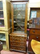 A NEAT 19th CENTURY MAHOGANY TWO PIECE BOOKCASE CUPBOARD, the upper section having a single door