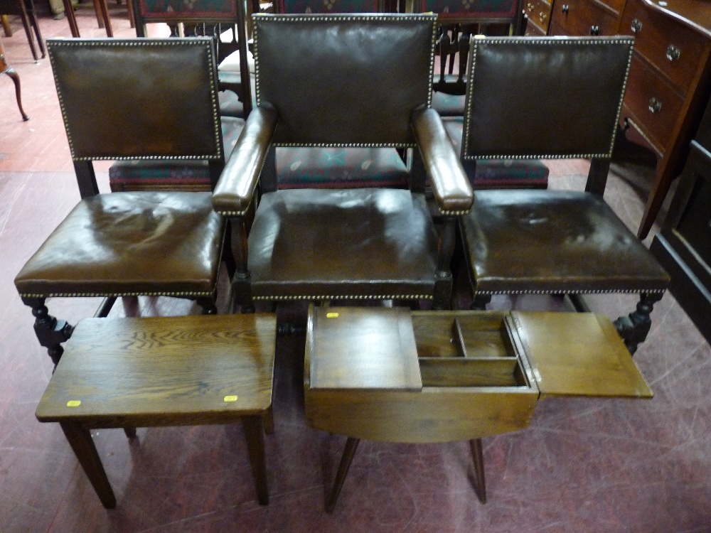 A PAIR OF LEATHER & STUDDED OAK DINING CHAIRS and matching elbow chair with turned and block