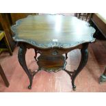 A GOOD EDWARDIAN MAHOGANY SIDE TABLE, the shaped 72.5 cms diameter top with leaf carved edging on